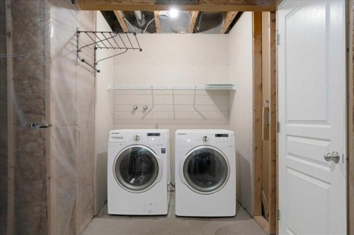 195 Marquis Common Se, Calgary, AB - Indoor Photo Showing Laundry Room