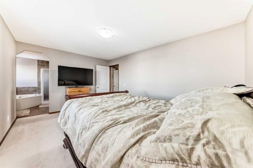 834 Cranston Drive Se, Calgary, AB - Indoor Photo Showing Bedroom