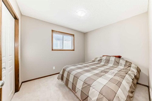 834 Cranston Drive Se, Calgary, AB - Indoor Photo Showing Bedroom