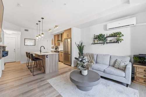 308-400 Auburn Meadows Common Se, Calgary, AB - Indoor Photo Showing Living Room