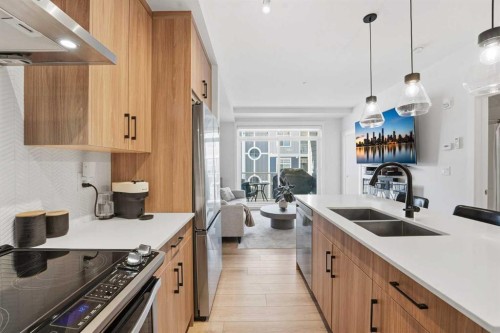 308-400 Auburn Meadows Common Se, Calgary, AB - Indoor Photo Showing Kitchen With Double Sink With Upgraded Kitchen