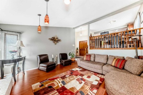 22 Glenhill Drive, Cochrane, AB - Indoor Photo Showing Living Room