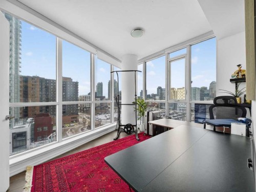 802-615 6 Avenue Se, Calgary, AB - Indoor Photo Showing Living Room