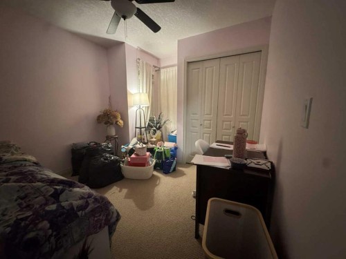 2105 New Brighton Gardens Se, Calgary, AB - Indoor Photo Showing Bedroom