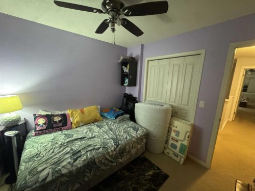 2105 New Brighton Gardens Se, Calgary, AB - Indoor Photo Showing Bedroom