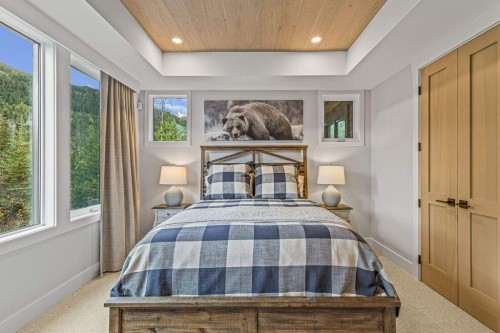 628 Silvertip Road, Canmore, AB - Indoor Photo Showing Bedroom
