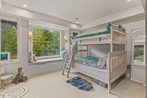 628 Silvertip Road, Canmore, AB - Indoor Photo Showing Bedroom