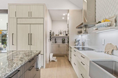 628 Silvertip Road, Canmore, AB - Indoor Photo Showing Kitchen With Upgraded Kitchen