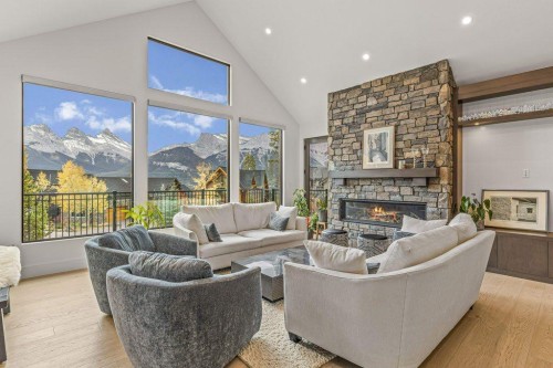 628 Silvertip Road, Canmore, AB - Indoor Photo Showing Living Room With Fireplace