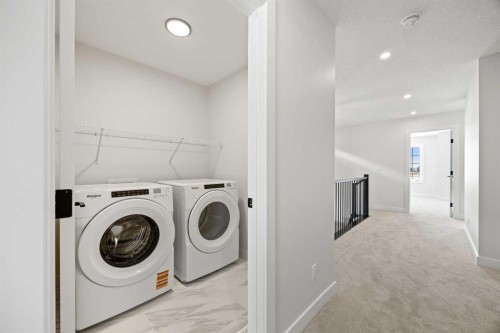 155 Greenwich Drive Nw, Calgary, AB - Indoor Photo Showing Laundry Room