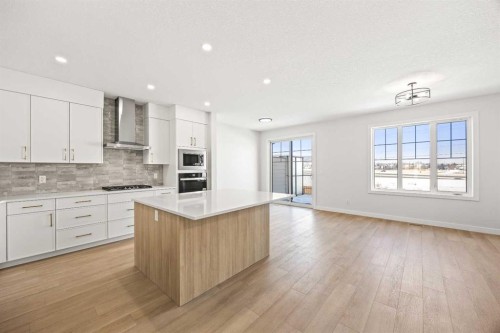 155 Greenwich Drive Nw, Calgary, AB - Indoor Photo Showing Kitchen With Upgraded Kitchen