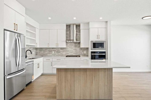 155 Greenwich Drive Nw, Calgary, AB - Indoor Photo Showing Kitchen With Upgraded Kitchen