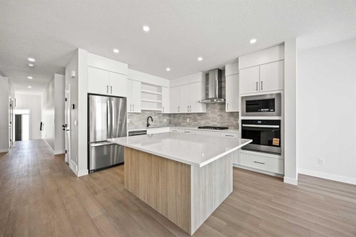 155 Greenwich Drive Nw, Calgary, AB - Indoor Photo Showing Kitchen With Upgraded Kitchen