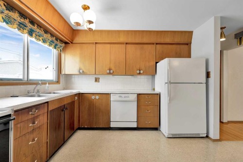 1483 Northmount Drive Nw, Calgary, AB - Indoor Photo Showing Kitchen With Double Sink