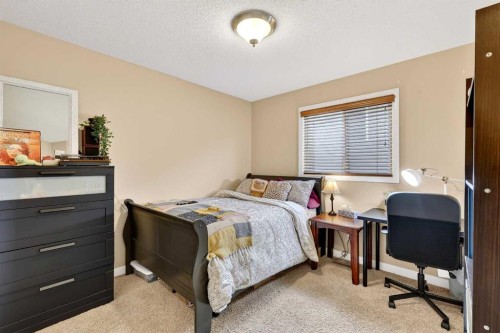575 Everbrook Way Sw, Calgary, AB - Indoor Photo Showing Bedroom