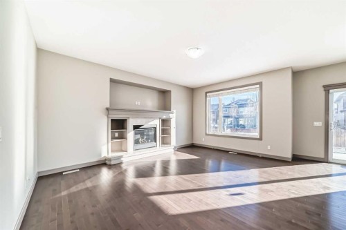 47 Evansglen Circle Nw, Calgary, AB - Indoor With Fireplace