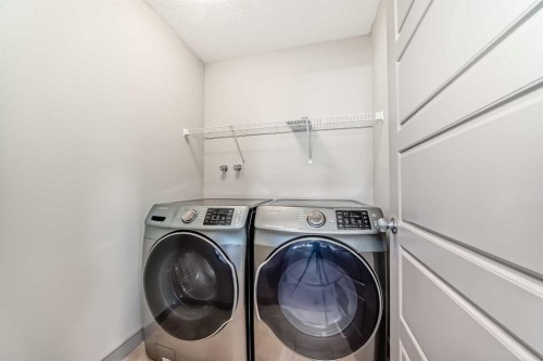 47 Evansglen Circle Nw, Calgary, AB - Indoor Photo Showing Laundry Room