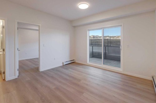 118-245 Edith Place Nw, Calgary, AB - Indoor Photo Showing Other Room