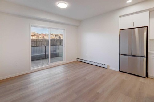 118-245 Edith Place Nw, Calgary, AB - Indoor Photo Showing Other Room