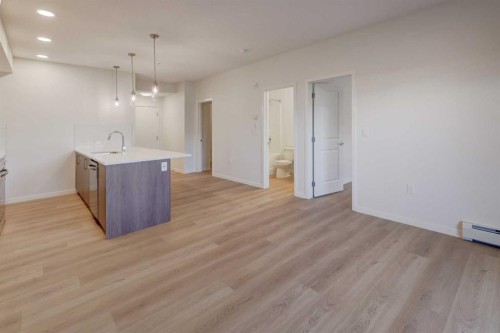 118-245 Edith Place Nw, Calgary, AB - Indoor Photo Showing Other Room