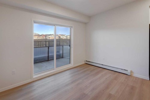 118-245 Edith Place Nw, Calgary, AB - Indoor Photo Showing Other Room