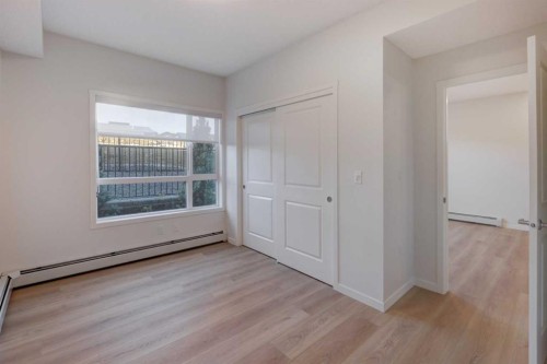118-245 Edith Place Nw, Calgary, AB - Indoor Photo Showing Other Room