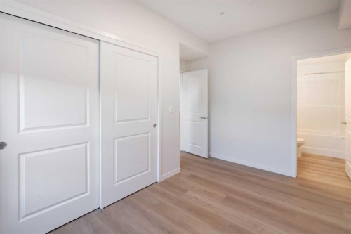 118-245 Edith Place Nw, Calgary, AB - Indoor Photo Showing Other Room