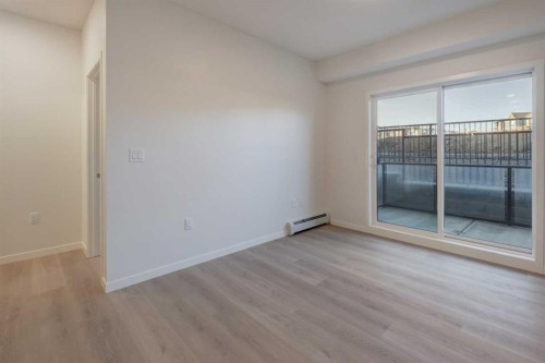 119-245 Edith Place Nw, Calgary, AB - Indoor Photo Showing Other Room