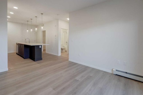 119-245 Edith Place Nw, Calgary, AB - Indoor Photo Showing Other Room