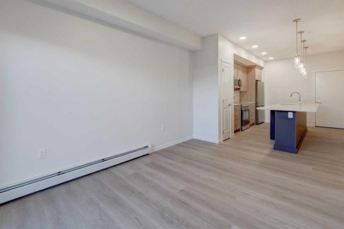 119-245 Edith Place Nw, Calgary, AB - Indoor Photo Showing Kitchen