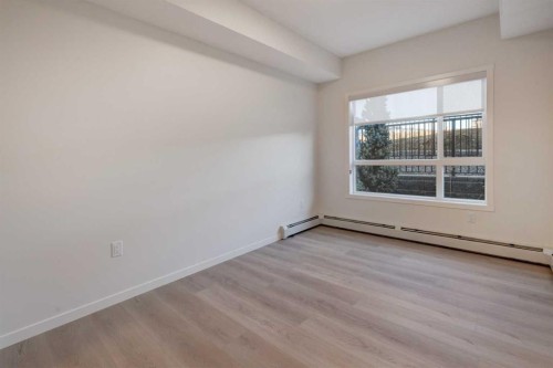 119-245 Edith Place Nw, Calgary, AB - Indoor Photo Showing Other Room