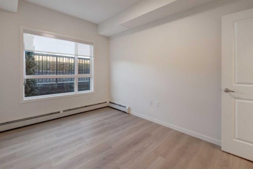 119-245 Edith Place Nw, Calgary, AB - Indoor Photo Showing Other Room