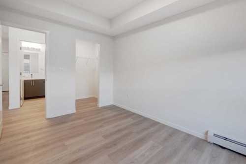 119-245 Edith Place Nw, Calgary, AB - Indoor Photo Showing Other Room