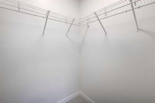 119-245 Edith Place Nw, Calgary, AB - Indoor With Storage