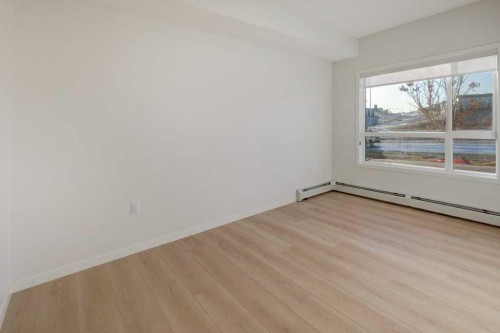 124-245 Edith Place Nw, Calgary, AB - Indoor Photo Showing Other Room