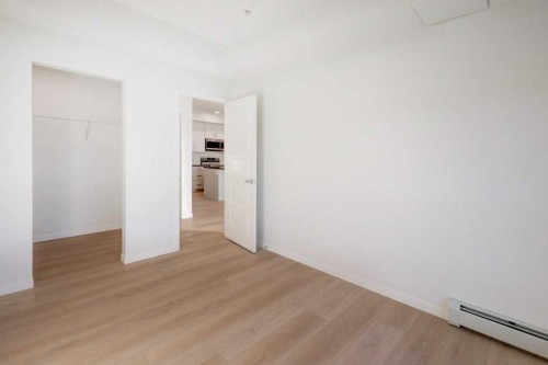 124-245 Edith Place Nw, Calgary, AB - Indoor Photo Showing Other Room
