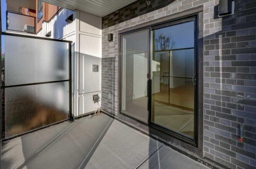 124-245 Edith Place Nw, Calgary, AB - Outdoor With Exterior
