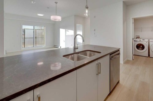 124-245 Edith Place Nw, Calgary, AB - Indoor Photo Showing Other Room