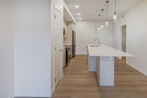 308-245 Edith Place Nw, Calgary, AB - Indoor Photo Showing Other Room