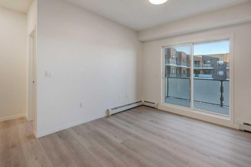 308-245 Edith Place Nw, Calgary, AB - Indoor Photo Showing Other Room