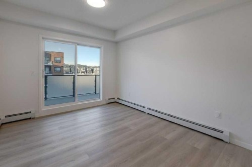 308-245 Edith Place Nw, Calgary, AB - Indoor Photo Showing Other Room