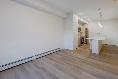 308-245 Edith Place Nw, Calgary, AB - Indoor Photo Showing Other Room