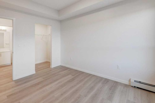 308-245 Edith Place Nw, Calgary, AB - Indoor Photo Showing Other Room