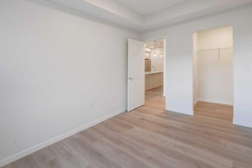 308-245 Edith Place Nw, Calgary, AB - Indoor Photo Showing Other Room