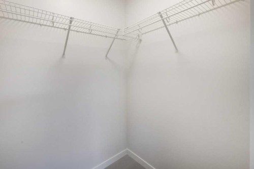 308-245 Edith Place Nw, Calgary, AB - Indoor With Storage