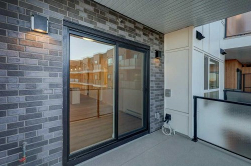 308-245 Edith Place Nw, Calgary, AB - Outdoor With Exterior
