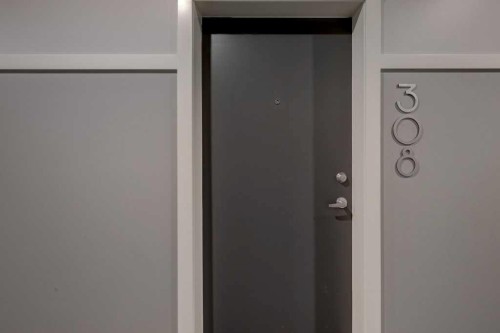 308-245 Edith Place Nw, Calgary, AB - Indoor Photo Showing Other Room