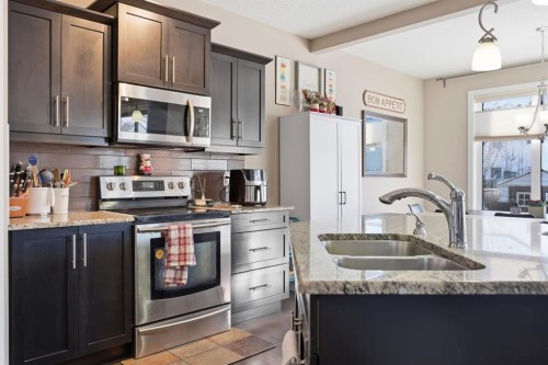 639 Copperpond Circle Se, Calgary, AB - Indoor Photo Showing Kitchen With Double Sink With Upgraded Kitchen