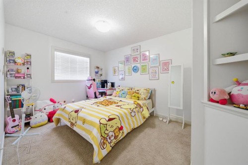 639 Copperpond Circle Se, Calgary, AB - Indoor Photo Showing Bedroom