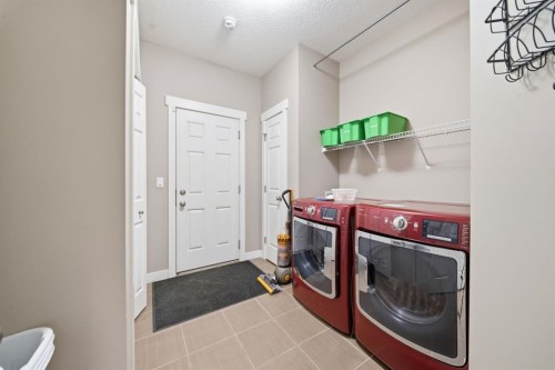 639 Copperpond Circle Se, Calgary, AB - Indoor Photo Showing Laundry Room